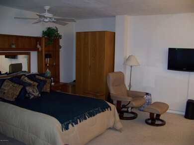 Bedroom area w/ wardrobe closet