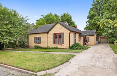 Bungalow-style house  front yard, driveway