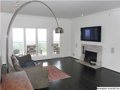 Beautiful living room with doors opening on to ter