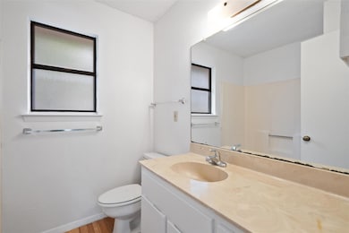 Bathroom featuring vanity, healthy amount of natu