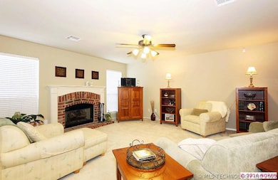 Spacious living room is light & bright!