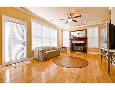 Living Room. solid oak floors, gas log fireplace, tall ceilings with crown everywhere