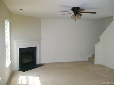 Family room with corner gas fireplace