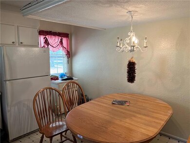 504 W Lucy Webb Rd, Raymore, MO 64083 - photo 4