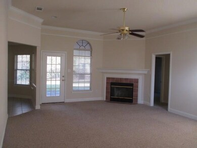 living room view from front door, dining area on l