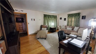 Spacious Living Room with beautiful hardwood floor