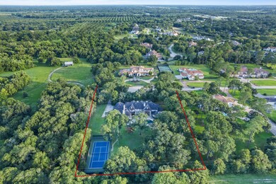 Aerial view from the back of the home, this small