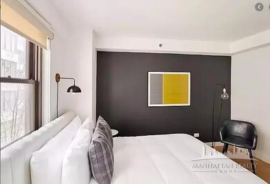 222 E 39th St unit 23-E, New York, NY 10016 - photo 2