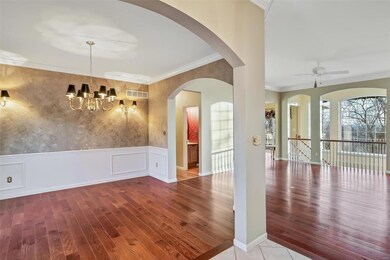 Formal dining room and living room look out to the