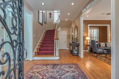 Enter thru iron door.  Spacious entry with living
