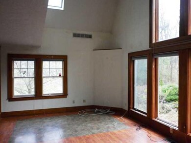 Great Room Cathedral great room with large glass w