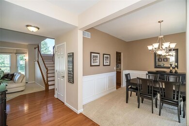 Hardwood flooring throughout the Entry and hallway
