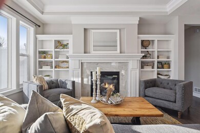 High end finishes including custom millwork and crown molding create a beautiful space.