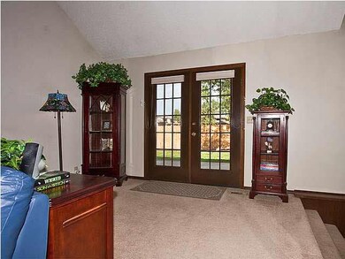 French doors in living room open onto back yard pa