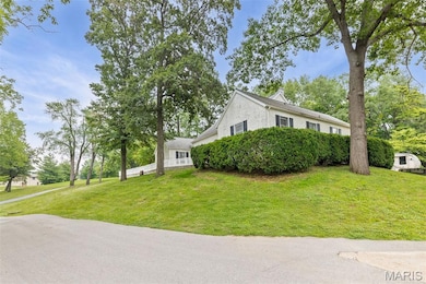 Doorway to property featuring stucco siding