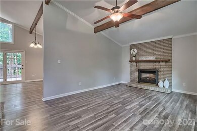 Vaulted ceiling and fireplace in great room
