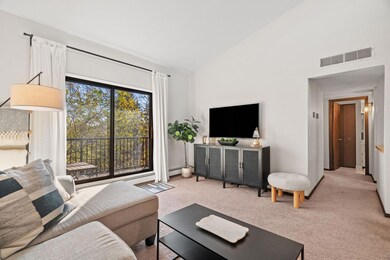 Patio doors lead to private balcony deck