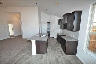 Kitchen - Photos are of a similarly finished home.