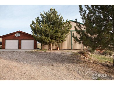 Two Car Garage and Huge Barn with paved driveway