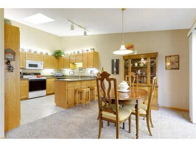 View of the Dining room and kitchen.  Skylight add