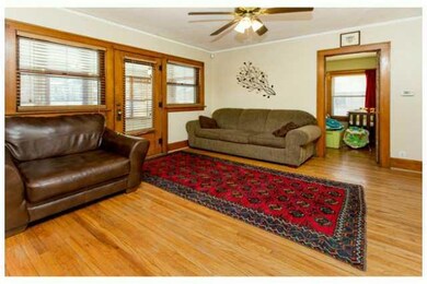 Living Room. Beautiful oak trim gives the room cha