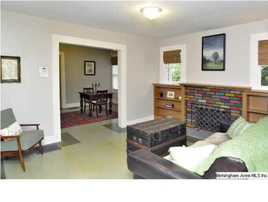 Brick fireplace with built in shelving.