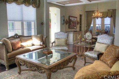 Living room and formal dining area. both with high