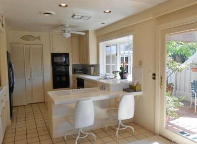 Cheery kitchen with garden window.