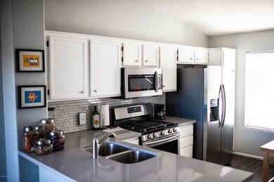 White Cabinets, Tiled Backsplash, Quartz