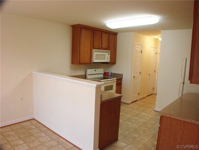 Kitchen as seen from near the door to the screened