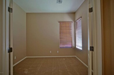 Den at front of home