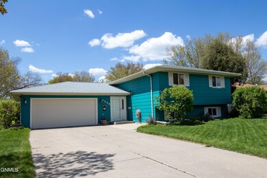 1425 6th Ave NE, Jamestown, ND 58401 - photo 2