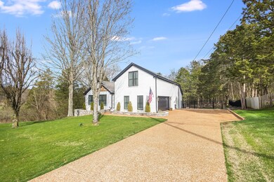 Extended aggregate driveway and 2.5 car side entry garage.