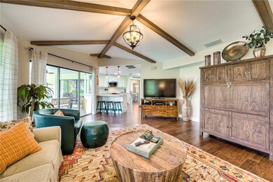 View of kitchen, bar area and access to lanai