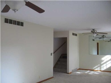 LIGHT AND AIRY LIVING AREA ON MAIN LEVEL.
