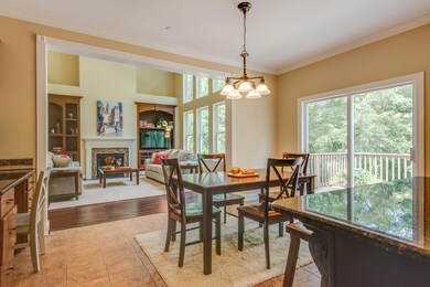 Family dining connects the kitchen to the great room. 