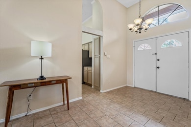 Step into a spacious foyer that offers the perfect