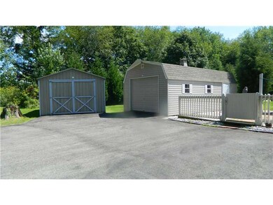 Parking Lot/Garage. Shed and 1 car garage