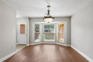 Formal Dining Area and Foyer in the background on