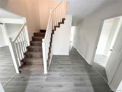 Stairway with wood finished floors