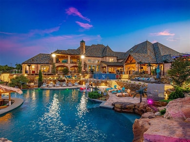 Pool at dusk with a patio