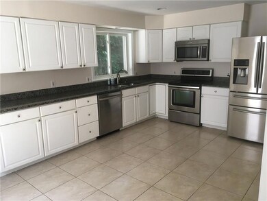 Large kitchen with granite counter...