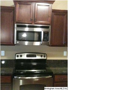 Custom cabinets and stainless appliances