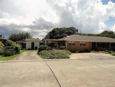 Side yard features 13x20 covered patio, 10x12 work