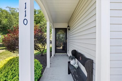 Charming front porch, covered for your packages or