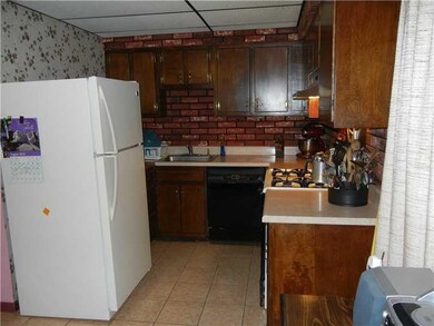 Kitchen. Original cabinets, all in good shape