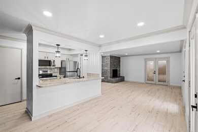 Kitchen with appliances with stainless steel finis