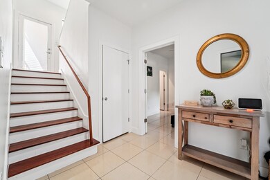 First floor entry hall is wide and spacious with a