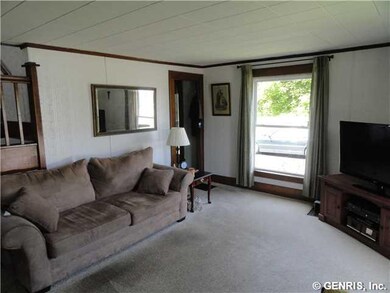 Living Room. 1st floor bdrm is on the left.
