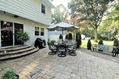 Decorative rounded steps down to patio area.